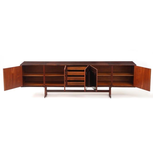 Produced in São Paulo in the 1960s by Móveis Novo Rumo, this credenza is among the more architectural case pieces to come...