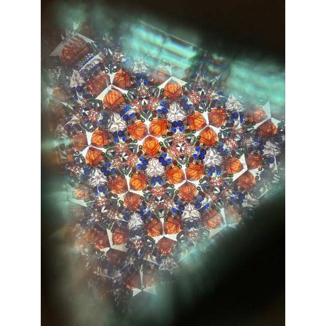 This is a handcrafted kaleidoscope featuring a polished wood barrel with elegant brass accents and a matching wooden...
