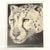 This artwork is a framed, black-and-white wildlife original ink drawing depicting a leopard's face. Artist signed on the...
