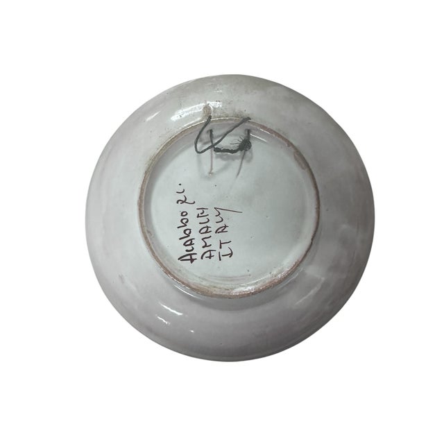 Imagine bringing a slice of the breathtaking Amalfi Coast into your home with our exquisite Ravello, Italy Pottery Wall...