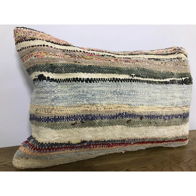 This is a vintage Turkish Anatolian kilim rug from the 1960s. The piece was hand-woven. Just cover no insert