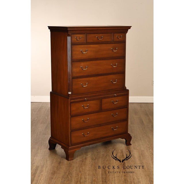 Fine quality vintage Kittinger chest-on-chest crafted in richly figured mahogany with classic Chippendale-inspired...