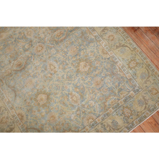 1920s Persian Tabriz rug in light blue and light yellow Measures: 4'5''' x 6'.
