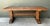 Constructed with heavy solid oak planks, this early 20th-century farmhouse dining table embodies traditional European...