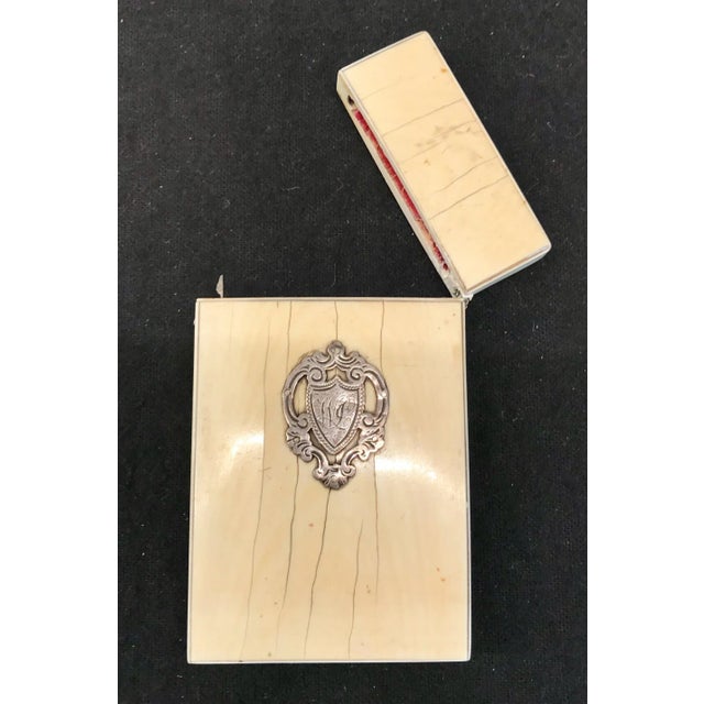 A very beautiful French bone(?) card case with sterling crest, bought in the North of France. In great shape but missing...