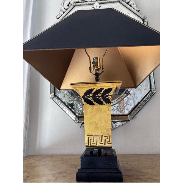 There are no markings on the lamp however, the shade is embossed "F Cooper" and the lamp is in keeping with Frederick...