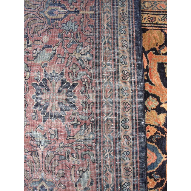 Introducing the exquisite Sarouk Feraghan, a timeless rug dating back to the late 1880s and remarkably preserved in...