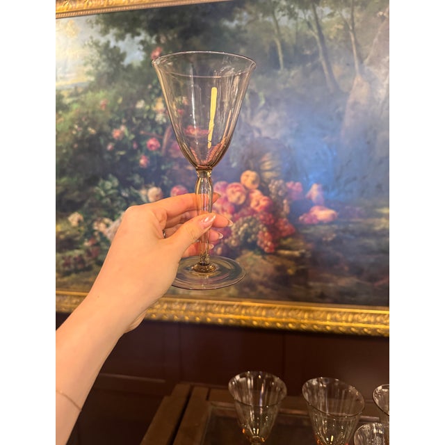 A rare and refined set of eleven hand-blown Murano stemware attributed to the influential Italian designer Vittorio...