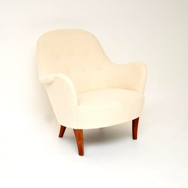 A stylish and iconic vintage Swedish Cirkus armchair by Carl Malmsten. It was made in Sweden, it dates from around the...