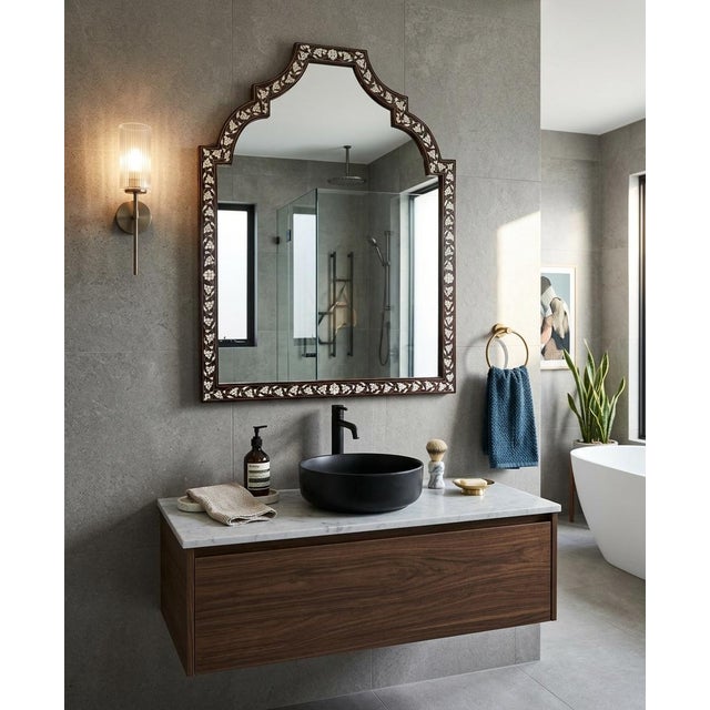 Elegant Levantine contemporary mother of pearl inlaid mirror. Beautiful arch design with ornate white mother of pearl with...