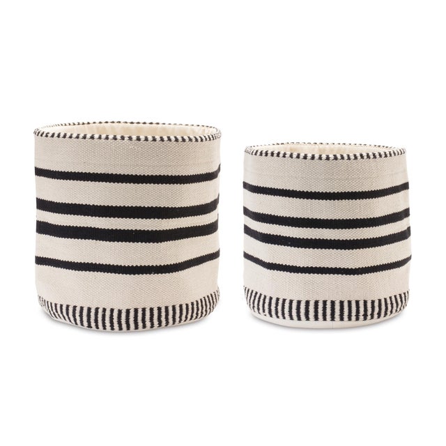Enhance your home organization with the stylish Striped Woven Cotton Storage Baskets. These versatile baskets, featuring a...