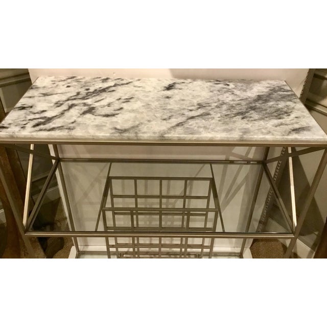 Stylish modern Sherrill Co. Silver Wine Rack, three glass display shelves and a black, white, and gray, stone top,...