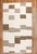 Intermediate-size Modern Turkish Kilim in ivory and brown made from recycled cotton and goat hair material giving it an...