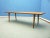Large teak coffee table from Denmark. Good to very good original condition. Overall minimal signs of wear. The coffee...