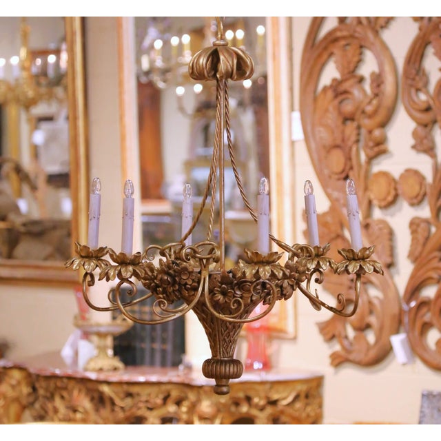 Illuminate a dining room, breakfast area, or entry with this elegant antique French chandelier crafted in the Louis XVI...