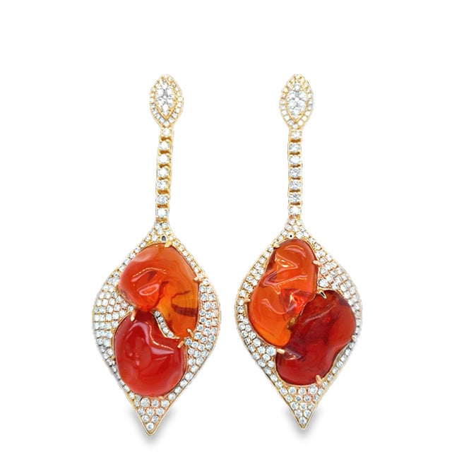 The Design combines the fiery intensity of Opals with the timeless brilliance of Diamonds, making these earrings both...