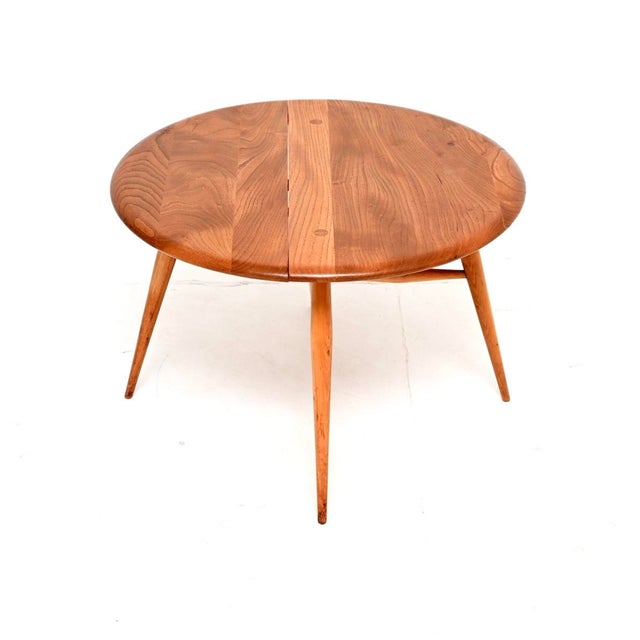 A stunning vintage Ercol drop leaf coffee table in solid Elm, this was made in England and dates from the 1960-70’s. It...