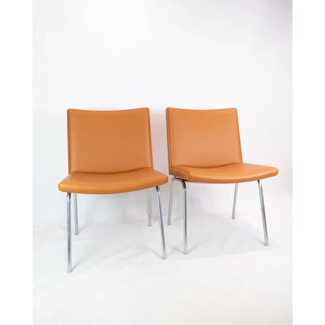 The ap40 lounge chair, designed by hans j. Wegner in 1958, is a remarkable part of the minimalist kastrup series, which is...