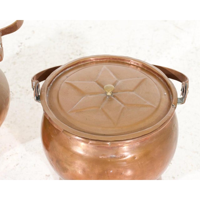 Two fine handmade copper holders with lit, signed, circa 1750 H. 19-22 Dia. 22-23 cm H. 7.4-8.6 Dia. 8.6-9 in