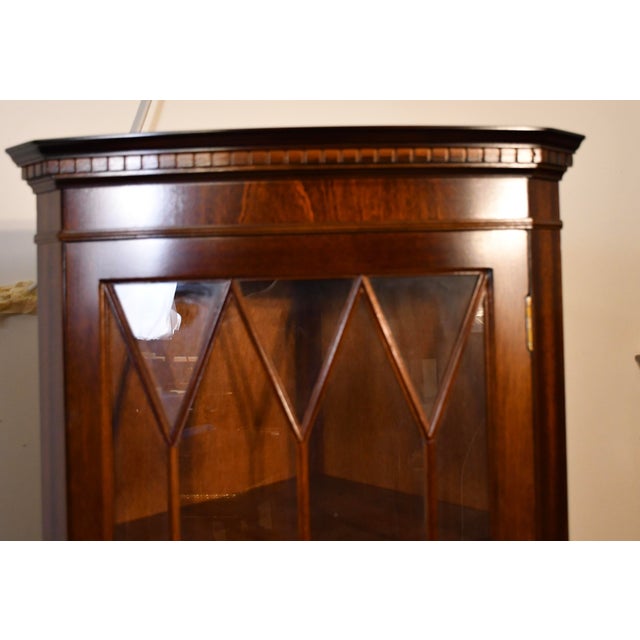 We are pleased to offer this beautiful pair of Georgian style display cabinets, from the 1950s. This pair is made of...