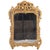 Finely executed in the Rococo taste with an elaborately pierced crest and scrolling foliate ornament, the richly carved...