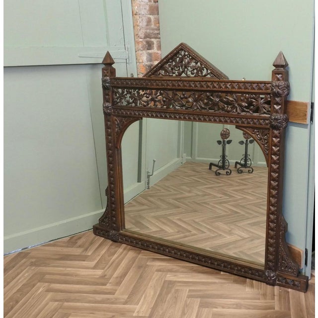 Large Carved Oak Overmantel This is a very skilfully carved large piece, it is a large mirror set in a superbly carved...