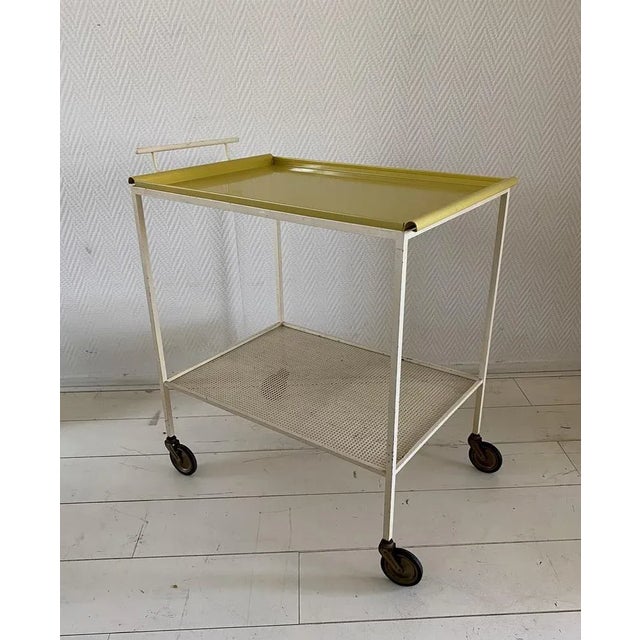 Mid-Century Modern Serving Trolley by Mathieu Matégot, 1960s, in Very Good conditions. Designed 1960 to 1969 This piece is...