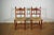Small chairs in carved turned wood and seat in hand-strawed hand-strawed 20s