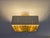 Paavo Tynell's "Starry sky" ceiling lamp, model 9068, brass and white painted metal, glass plate on top of the grille. The...