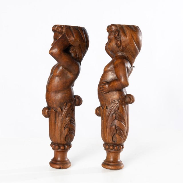 Antique Carved Cherubs. These probably came off of a piece of furniture. They could be added to a secretary that needs...