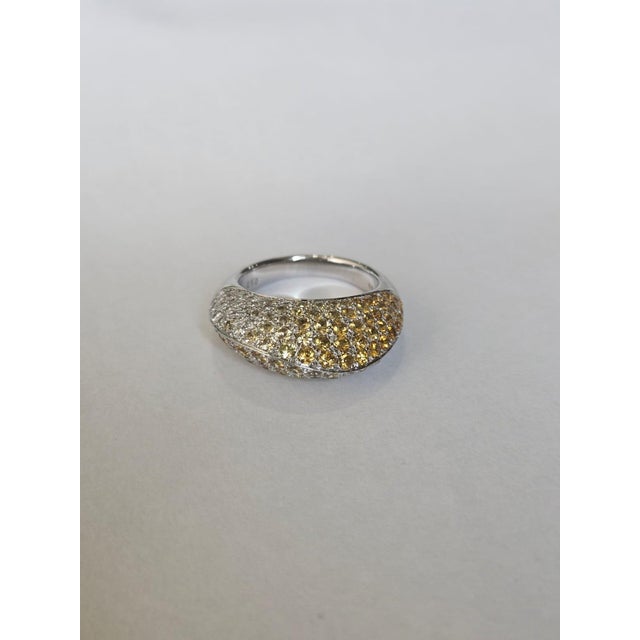 A very gorgeous and beautiful, modern style, Yellow Sapphire Cocktail Dome Ring set in 18K White Gold & natural Diamonds....