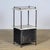 This iron nightstand dates from around 1920 and exudes character and craftsmanship. The frame has been stripped of old...