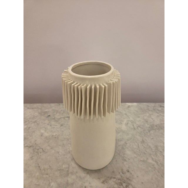 Tall cream glazed vase with added rectangle detailing