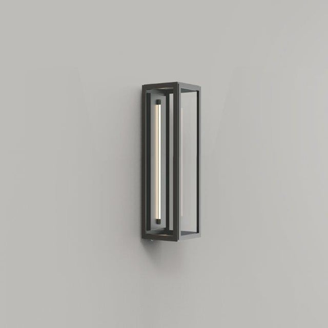 Modern wall lamp in extruded brass profile. Glass top / bottom. Dimensions: width 125mm - height 400mm - depth 115mm. LED...
