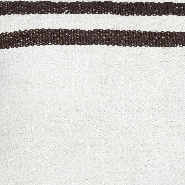 Add a touch of history and warmth to your space with this vintage handmade Turkish hemp kilim cushion cover. Crafted from...