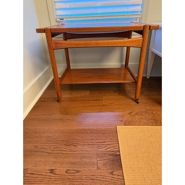 Designed by celebrated Danish designer Hans J. Wegner and manufactured in Denmark by Andreas Tuck, this vintage AT-48...