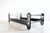 1970's rectangular black and white coffee table with chrome details in so called OP style representative of the era. The...