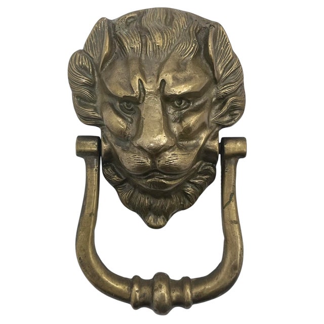 An impressive lion's head door knocker on a large door always makes for a grand and sophisticated entrance. This beautiful...