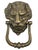 An impressive lion's head door knocker on a large door always makes for a grand and sophisticated entrance. This beautiful...