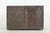 Reclaimed European rectangular vault box made of brown painted steel and cast iron with an orange painted interior. The...