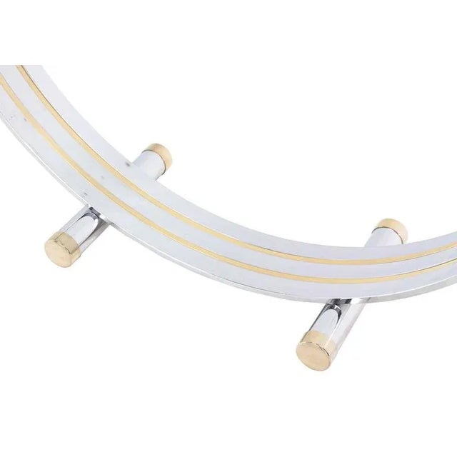 Stunning mid century modern brass and chrome U-shape base console table. Made in the mid 20th century.