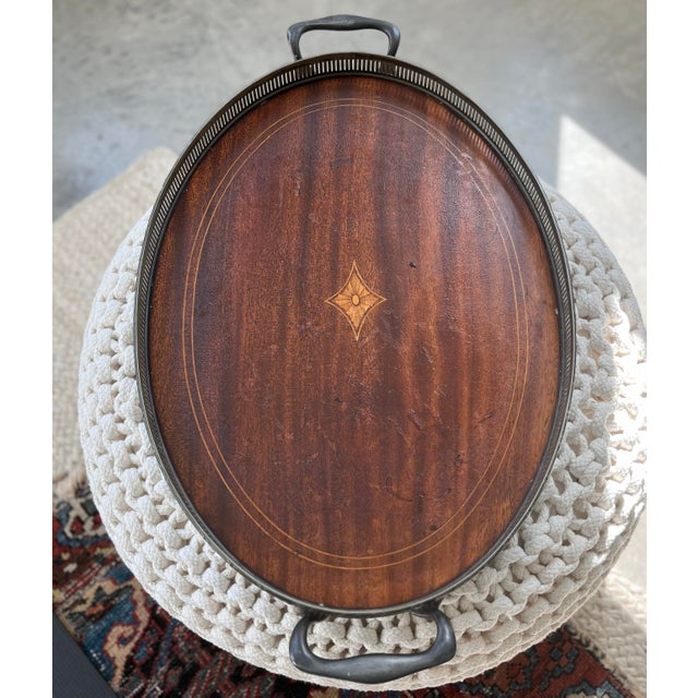 A simply gorgeous, antique, butler's tray from the late 1800s with its mahogany base with an inlaid diamond design set...
