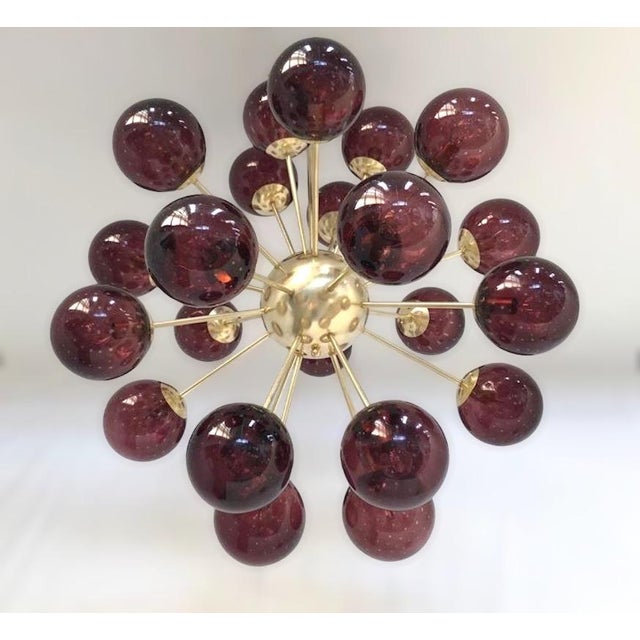 Italian sputnik chandelier with 24 amethyst Murano glass globes carefully hand blown with bubbles inside the glass using...
