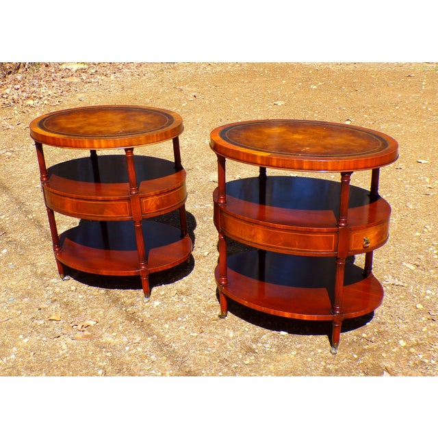 Vintage Pair Weiman Furniture three-tiered side tables, in the English Regency style. Made of solid and flame pattern...