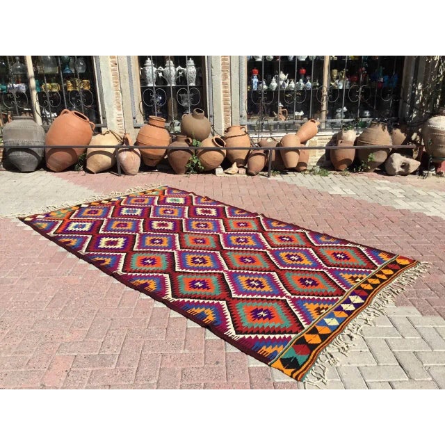 This beautiful, vintage, handwoven kilim is approximately 50 years old. It is handmade, of very fine quality hand spun...