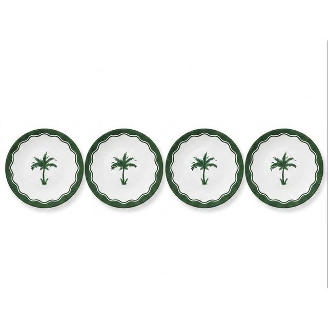 This striking set of four dinner plates represents a sophisticated collaboration between Anthropologie and Fern & Co.,...