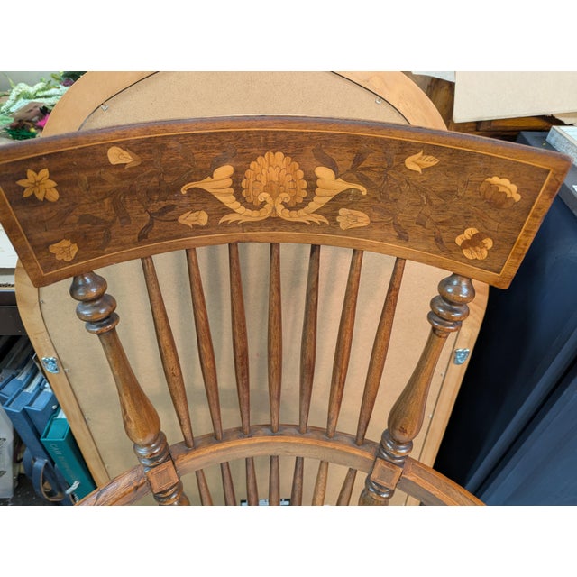 Solid mixed wood Arm Chair inlay with mixed natural woods. Interesting rounded arms. Very sturdy and comfortable. No rips...