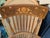 Solid mixed wood Arm Chair inlay with mixed natural woods. Interesting rounded arms. Very sturdy and comfortable. No rips...