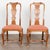 Late 18th century Danish Rococo side chairs, crafted in oak. The chairs feature graceful cabriolet legs joined by a turned...