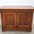 Antique Italian sideboard, crafted from solid walnut and dating back to the mid-19th century. This sideboard features...